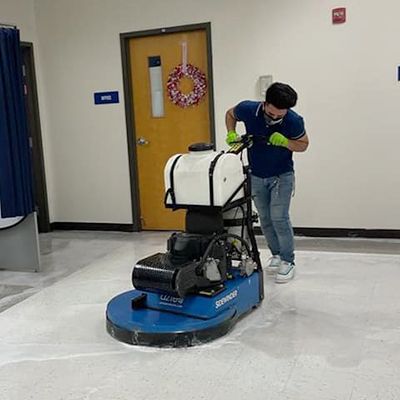Man Working with a floor scrubber